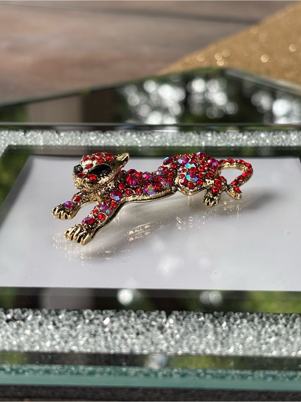 Gold-tone Leopard Pin with Red Crystal Accents